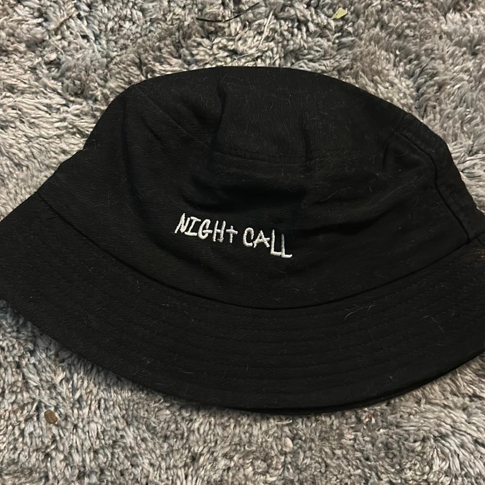 Night call, smiley face bucket hat from ROMWE.